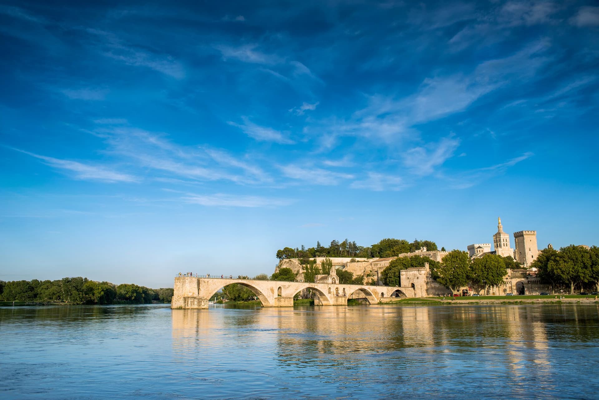 Pont Saint-Bénézet bridge and the Palais des Papes along the Rhône River in Avignon, France